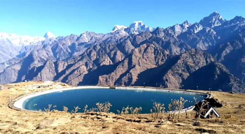 Artificial Lake in Auli reflecting the mountains — best places to visit in summer in India for serene views and cool weather.