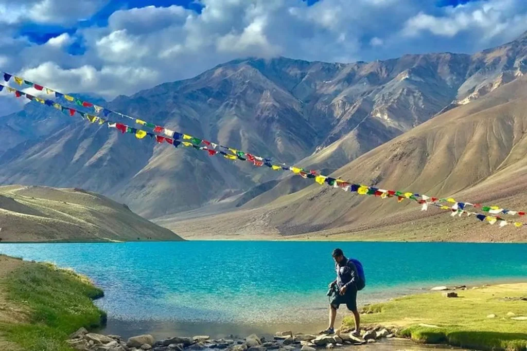 Chandratal Lake with turquoise waters surrounded by barren mountains — best places to visit in summer in India for remote natural beauty.