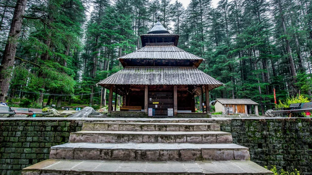 Hadimba Temple nestled among tall deodar trees in Manali — best places to visit in summer in India for peaceful nature and culture.