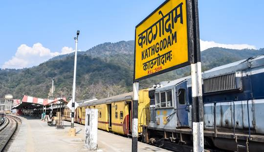 Kathgodam Railway Station surrounded by green hills — best places to visit in summer in India gateway to Nainital and Kumaon hills.