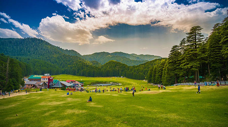 Khajjiar’s green meadows with a lake and pine forests — best places to visit in summer in India for nature and serenity.