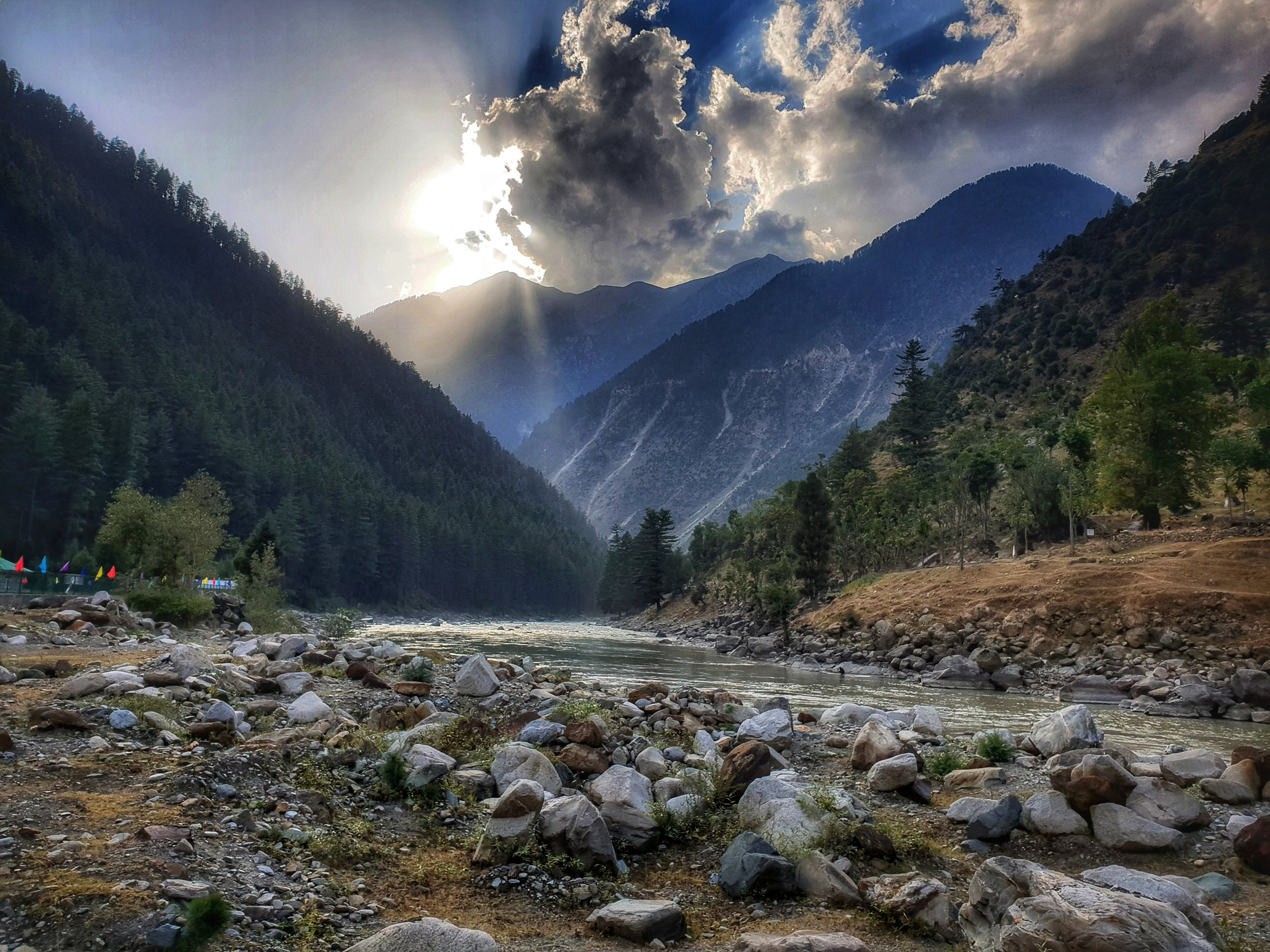 Kupwara (places to visit in Kashmir), a scenic valley with rolling green meadows, dense forests, and distant snow-capped Himalayan peaks.