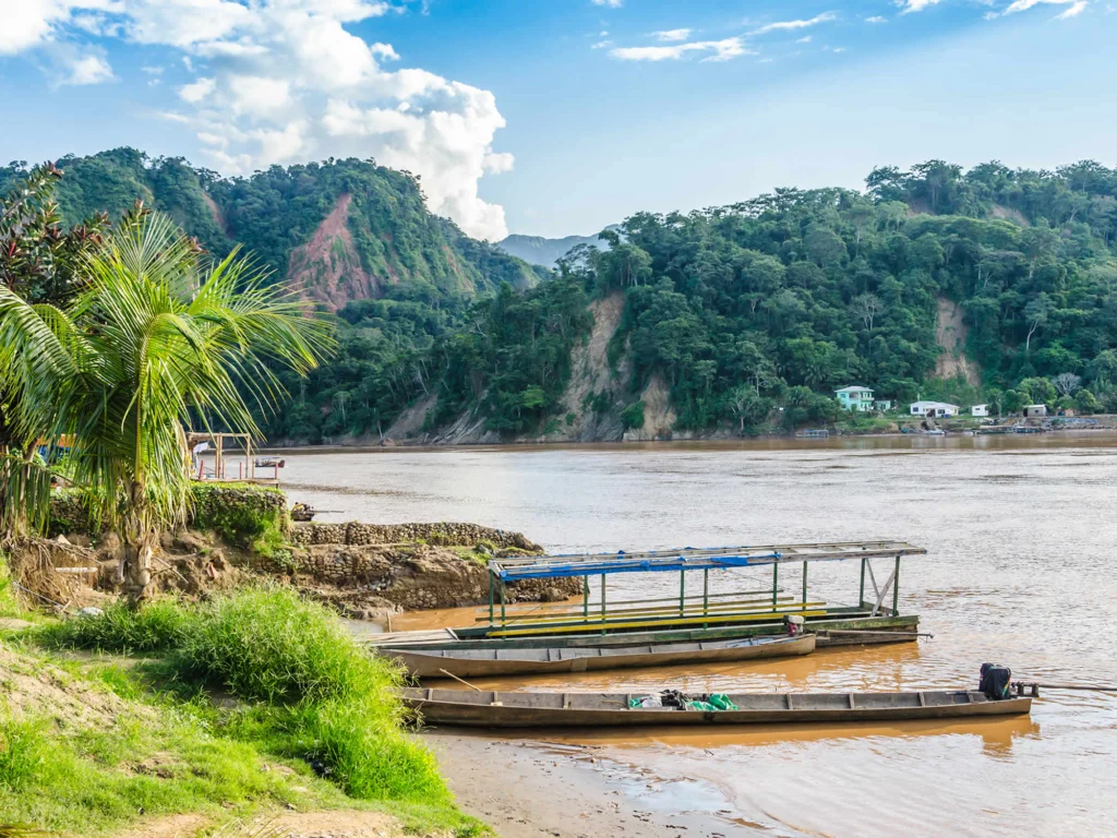 Boats docked on the riverbank in Rurrenabaque — your gateway to jungle adventures and unique things to do in Bolivia.