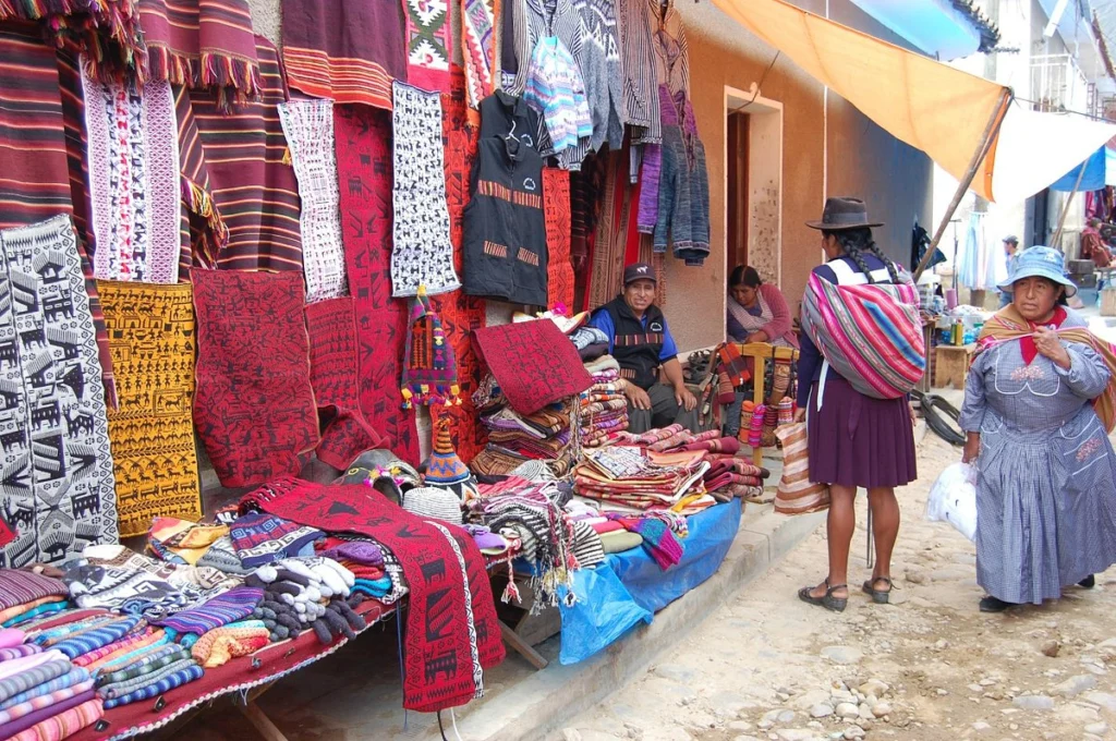 Locals in traditional Yampara attire at Tarabuco Market — a vibrant cultural stop among the top things to do in Bolivia.