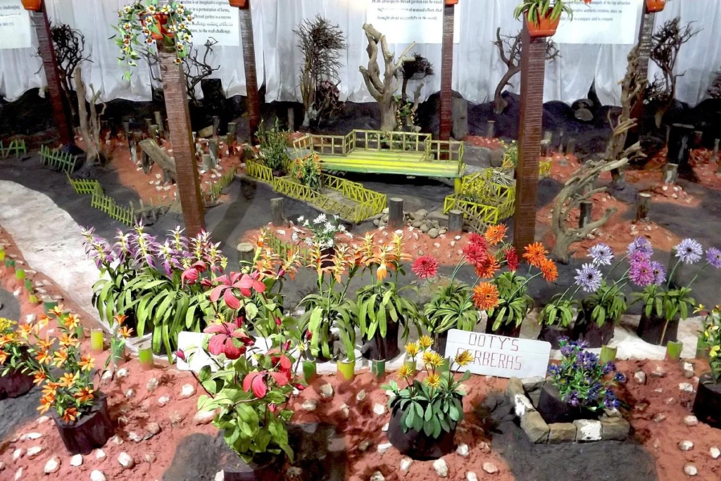 Colorful handwoven flowers at Thread Garden – a romantic Ooty tourist place to visit for honeymoon couples who love art and creativity.